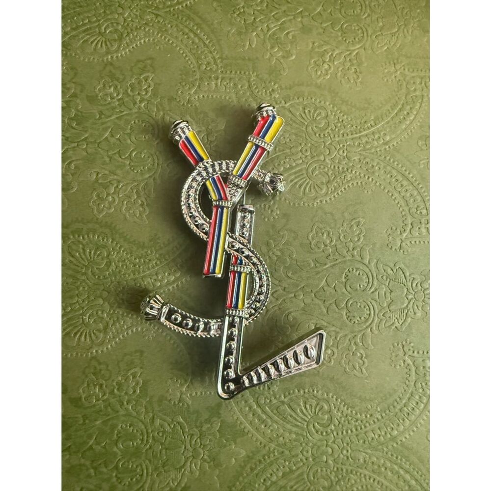 New Saint Laurent silver tone brooch no box 3 h inch by 2 w